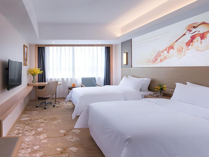 Vienna Hotel Shenzhen Pingji Ave Esterno foto